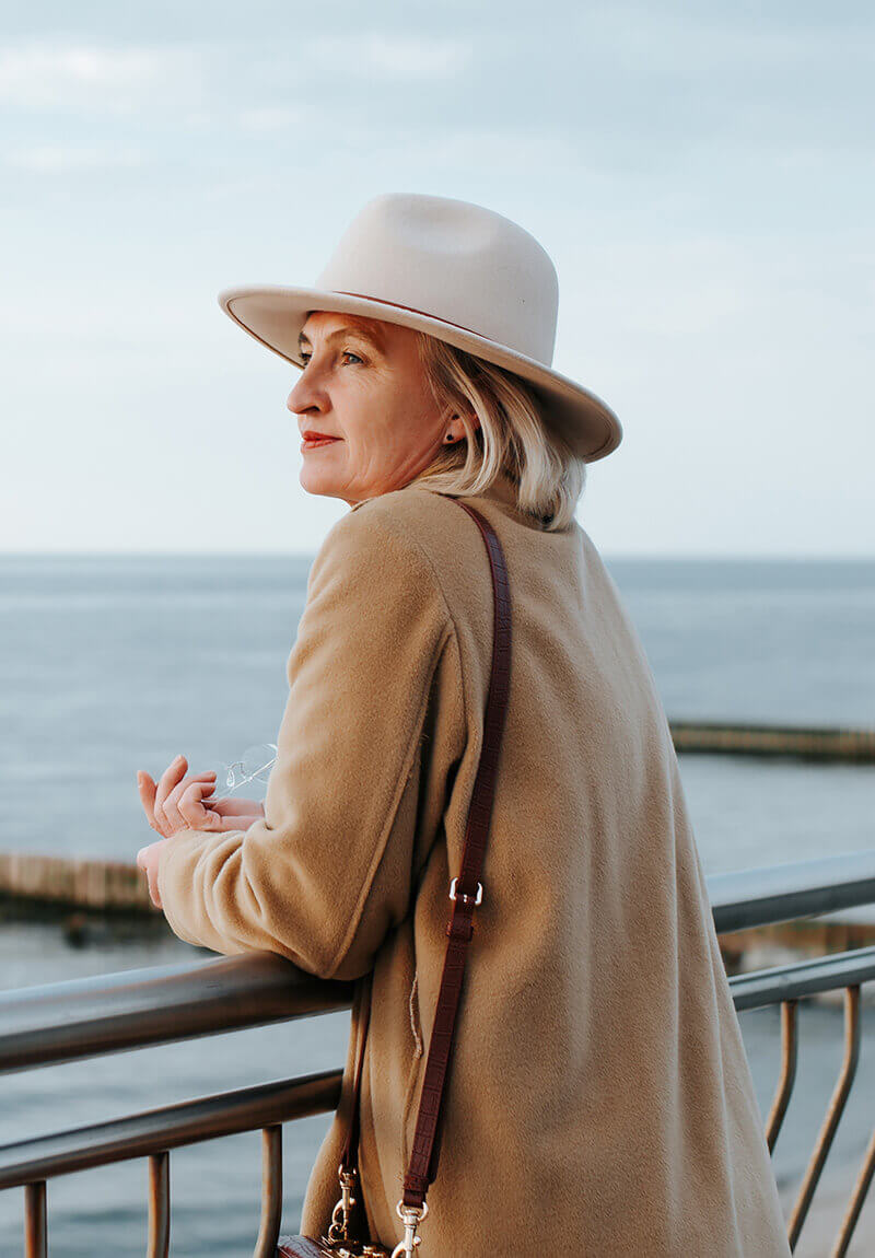 Mature woman looking out over the ocean