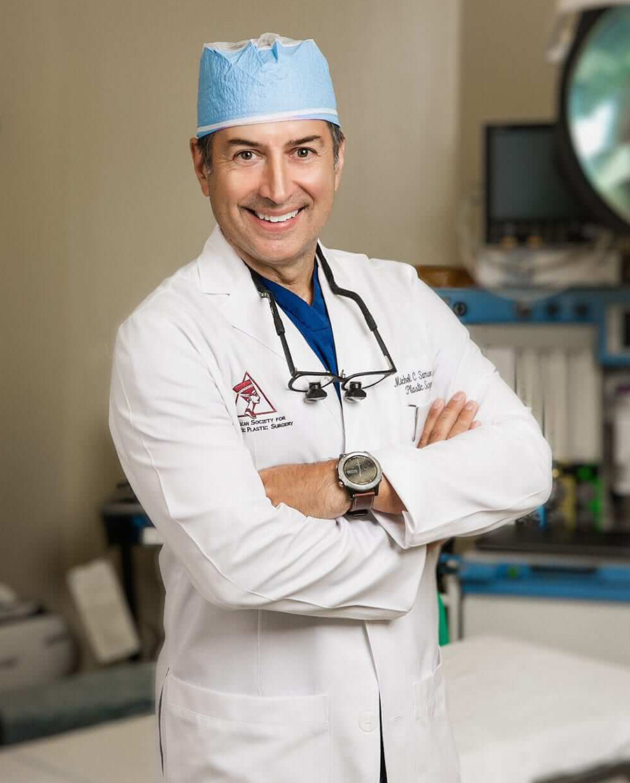 Dr. Samson in white lab coat